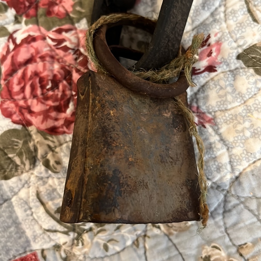Antique cow bell and leather collar